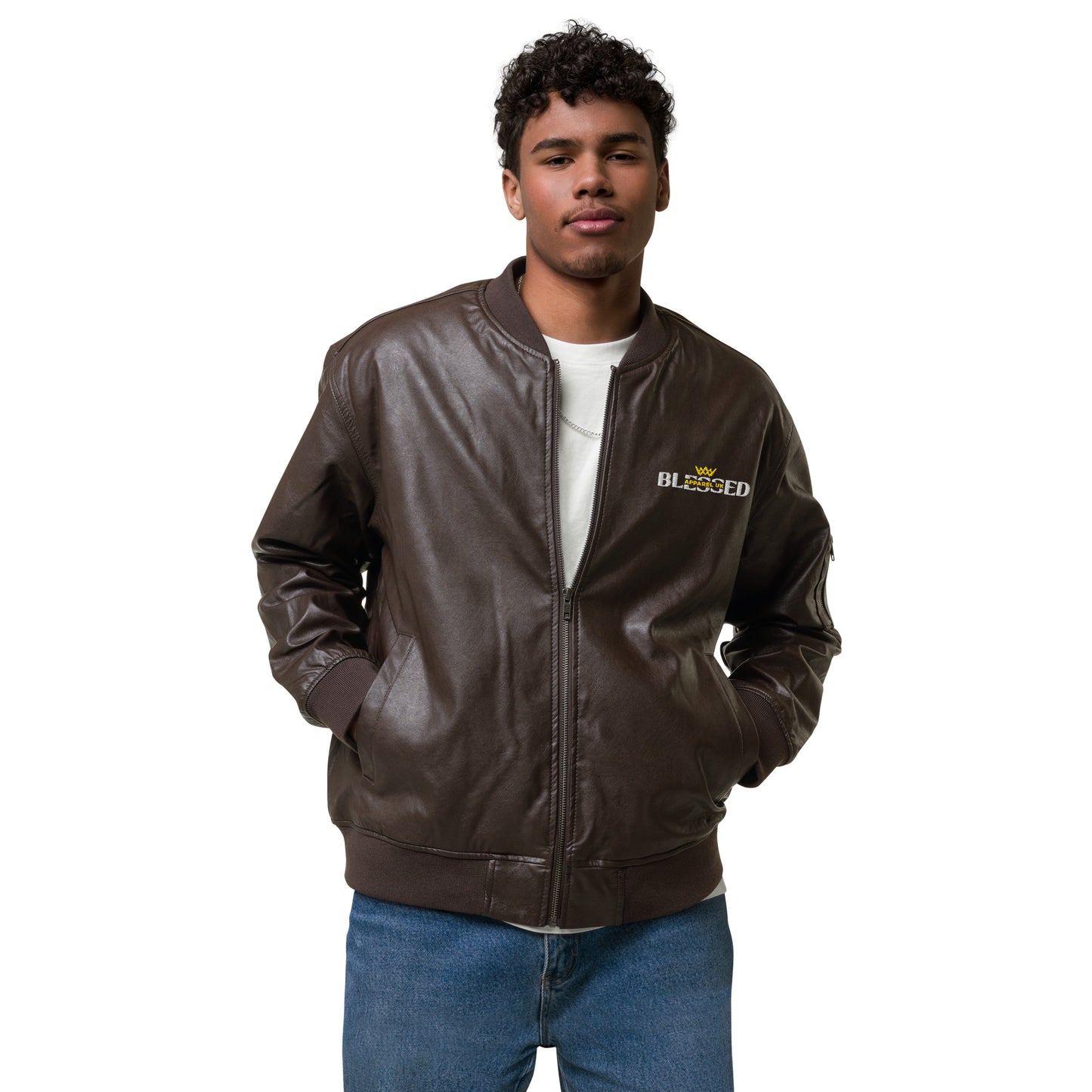 Image of a smiling person wearing a brown jacket with blessed apparel logo in yellow and white.