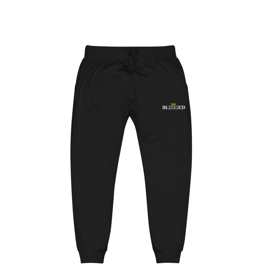 Flat lay image of black sweatpants with blessed apparel logo in yellow and white.