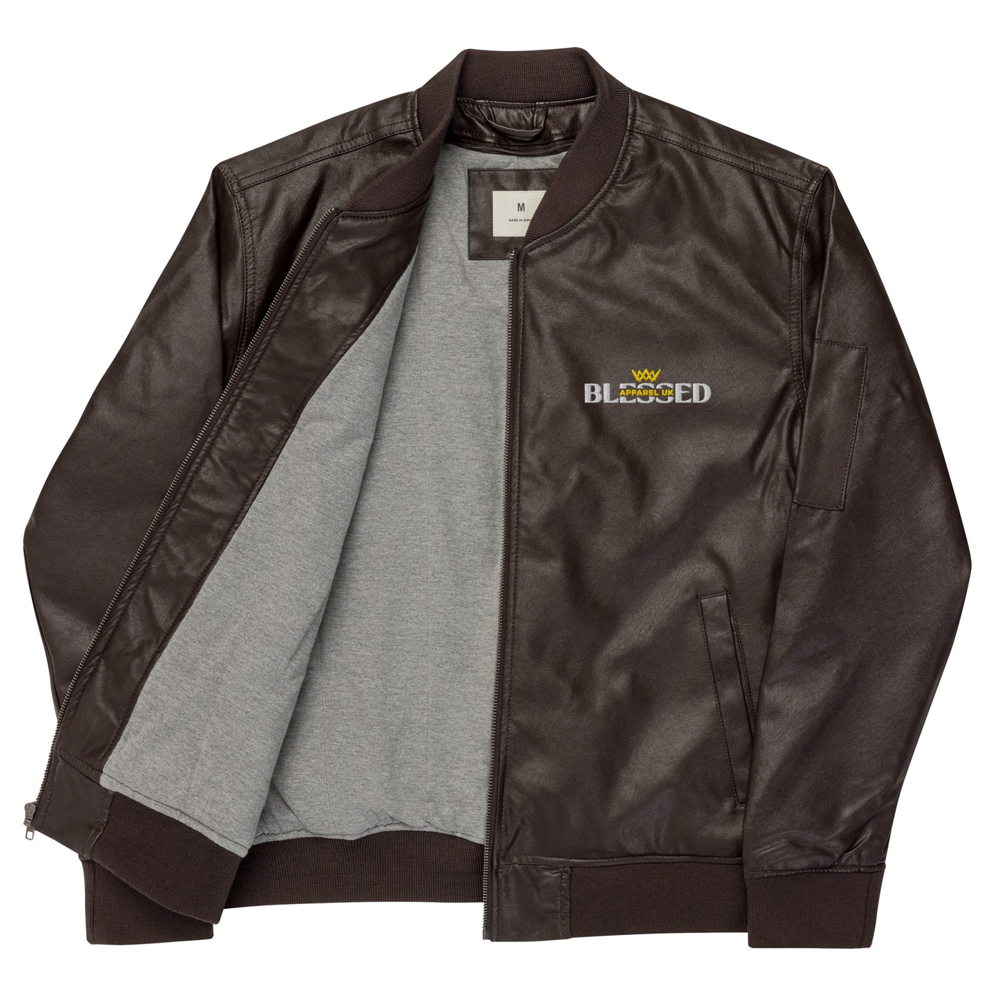 Image of a brown jacket with blessed apparel logo in yellow and white.