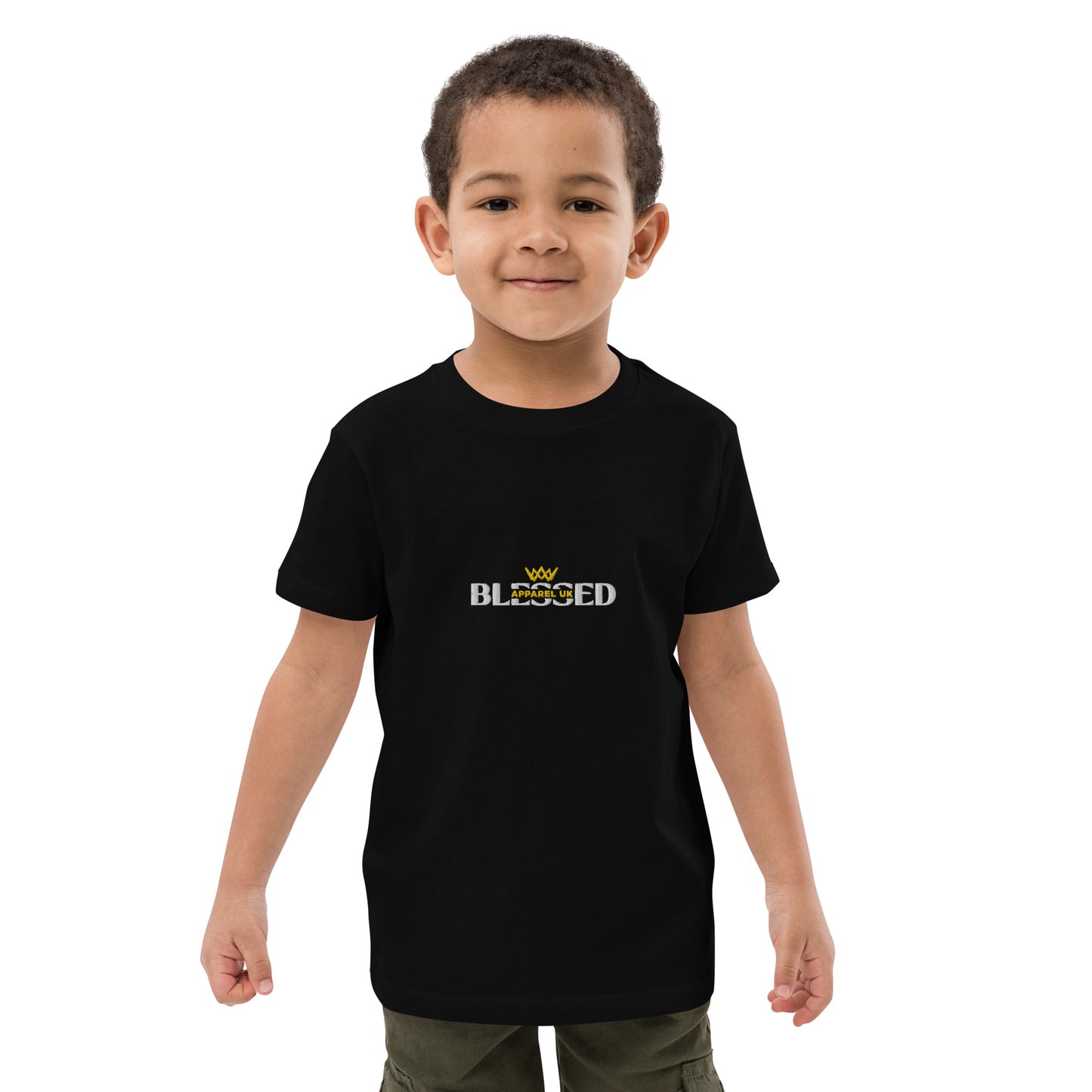 A child wearing a black t-shirt with the Blessed Apparel UK logo in gold and white across the chest.