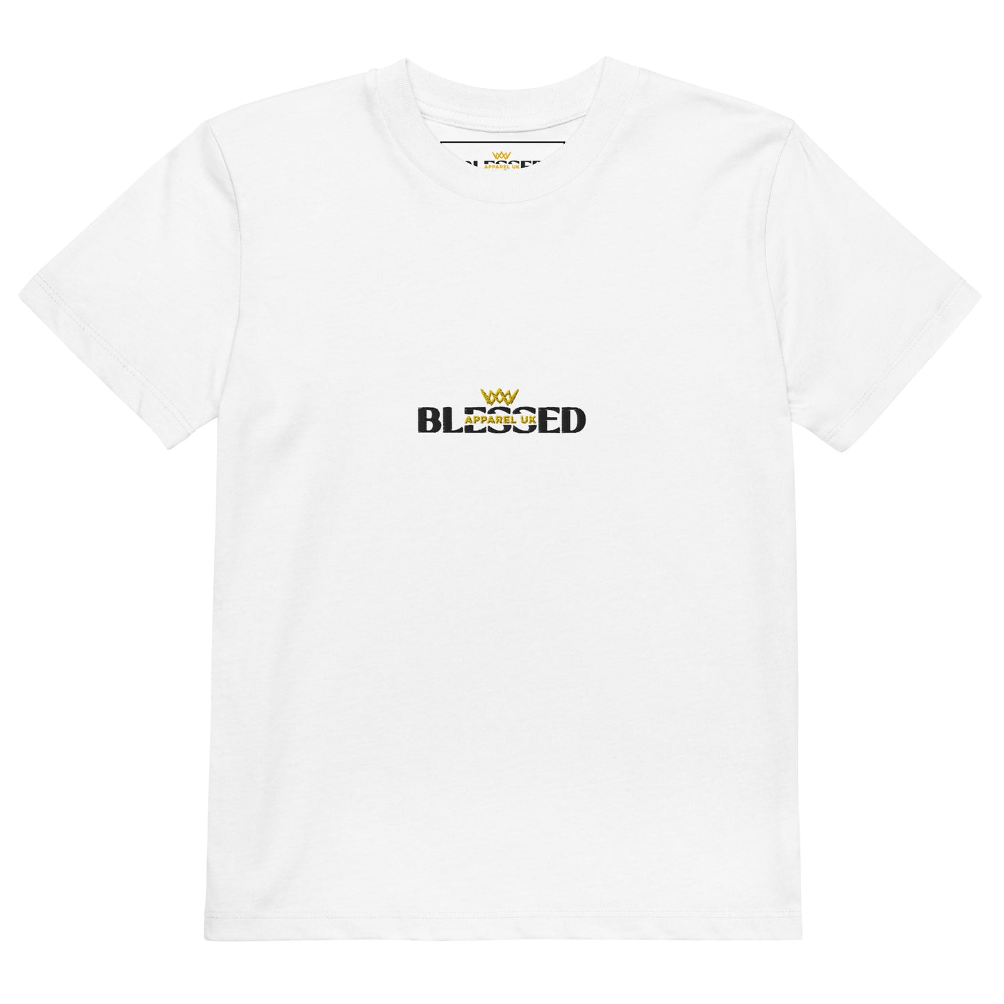 A flat-lay of a child's white t-shirt with the Blessed Apparel UK logo in gold and black across the chest.