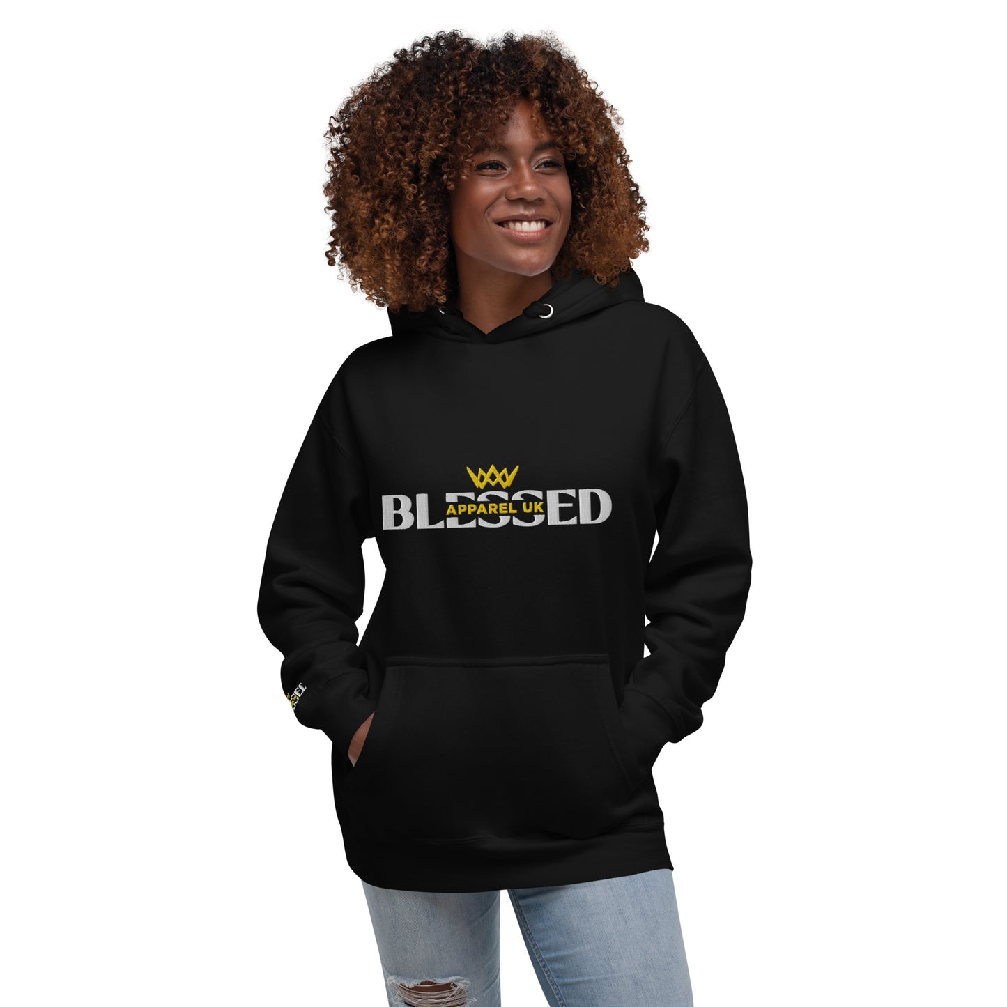 Image of a smiling person wearing a black hoodie with blessed apparel logo in yellow and white.